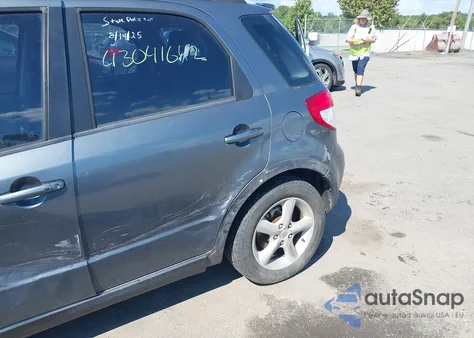 2009 Suzuki Sx4 Touring z USA, uszkodzony, nr VIN JS2YB417996201993